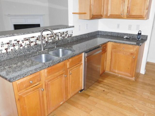 4304 Defoors Farm Trail Powder Springs, GA 30127 - Photo 15 of 41 a kitchen with granite countertop a sink and a stove