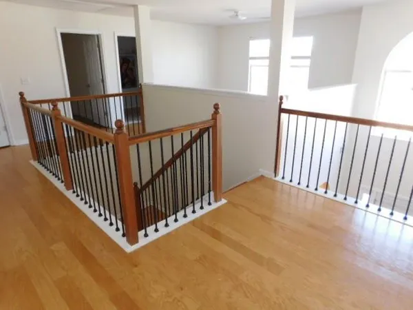a view of a hallway with windows