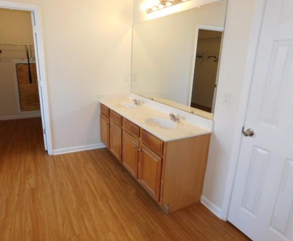 4304 Defoors Farm Trail Powder Springs, GA 30127 - Photo 29 of 41 a utility room with wooden floor washer and dryer