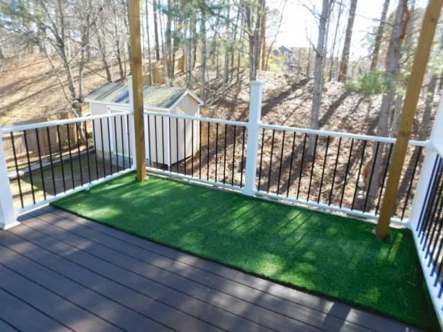 4304 Defoors Farm Trail Powder Springs, GA 30127 - Photo 35 of 41 a view of a backyard with wooden fence