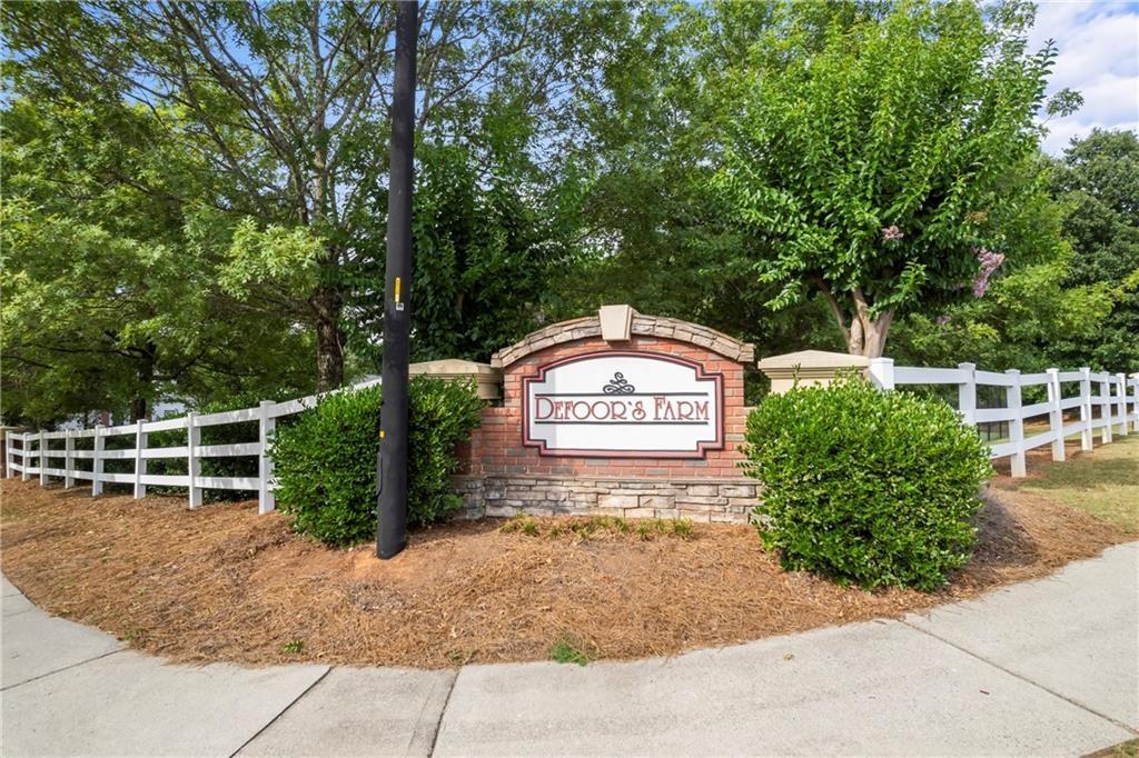 4304 Defoors Farm Trail Powder Springs, GA 30127 - Photo 38 of 41 a view of a park with iron fence