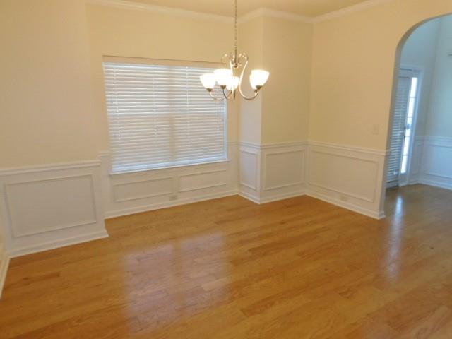 4304 Defoors Farm Trail Powder Springs, GA 30127 - Photo 4 of 41 a view of empty room with wooden floor and fan