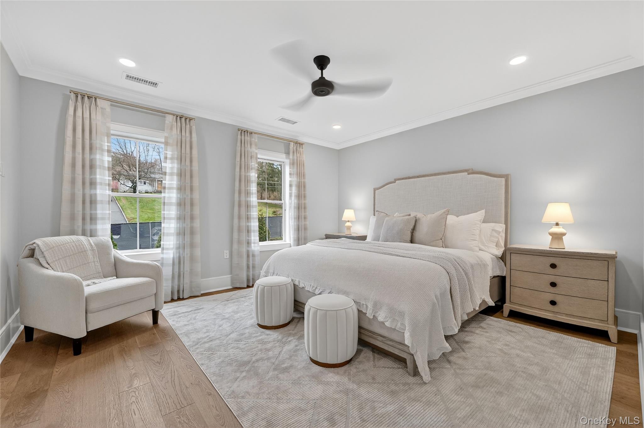 1801 Soundview Court Yorktown Heights, NY 10598 - Photo 16 of 33 a spacious bedroom with a bed and a couch