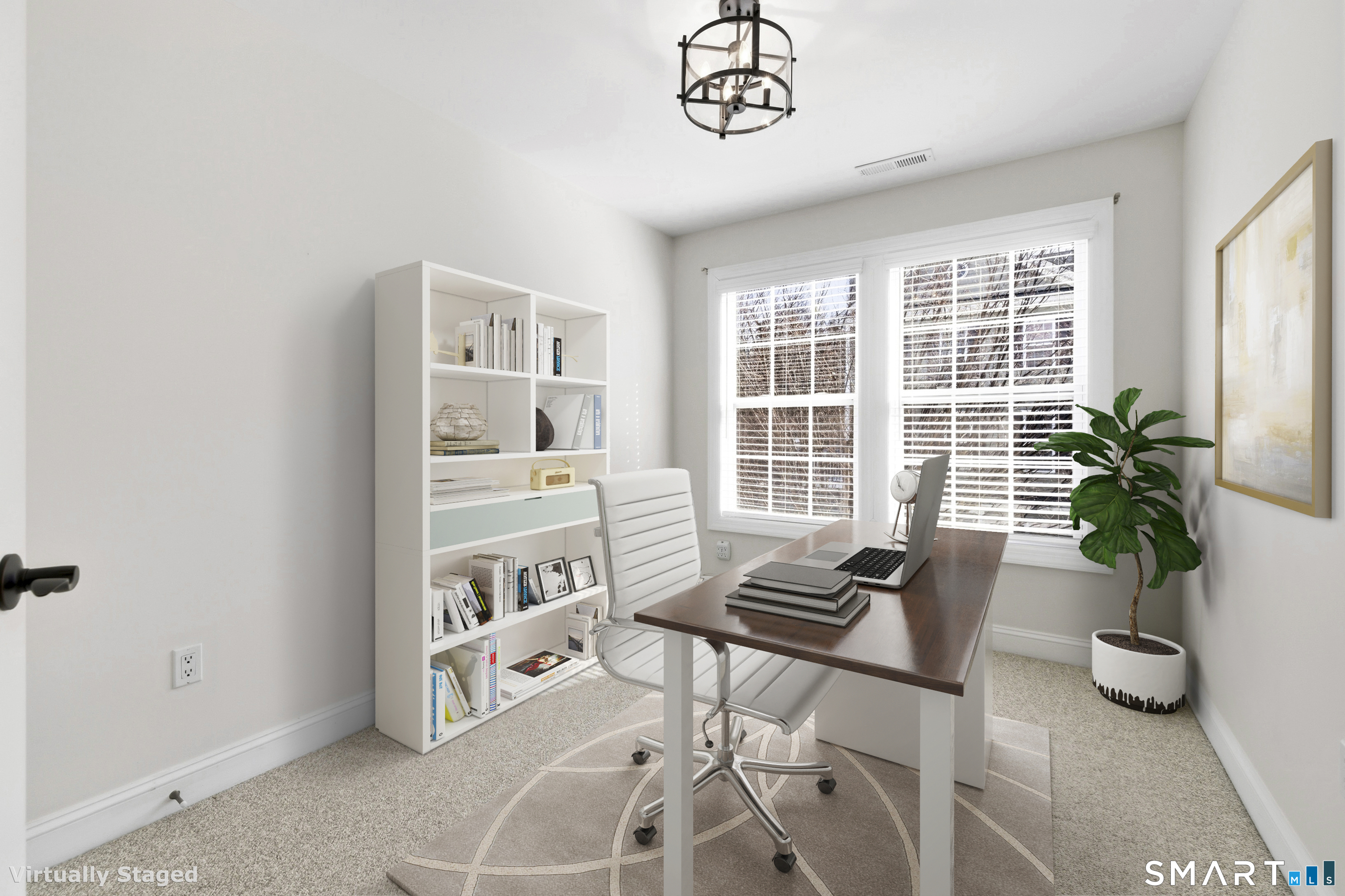 13 Mercy Street, Unit 13 Danbury, CT 06810 - Photo 26 of 40 a living room with furniture and a potted plant