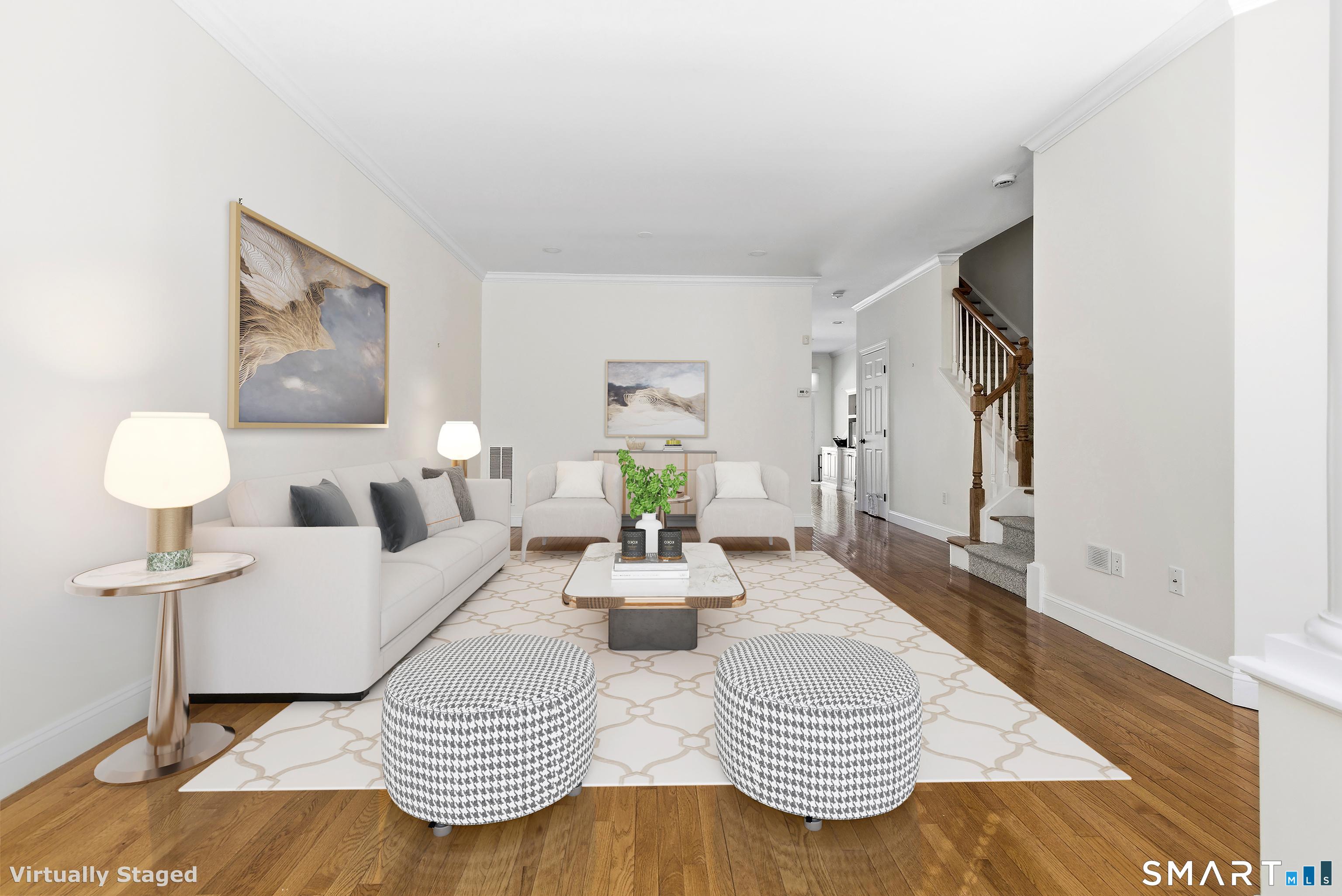 13 Mercy Street, Unit 13 Danbury, CT 06810 - Photo 3 of 40 a living room with furniture