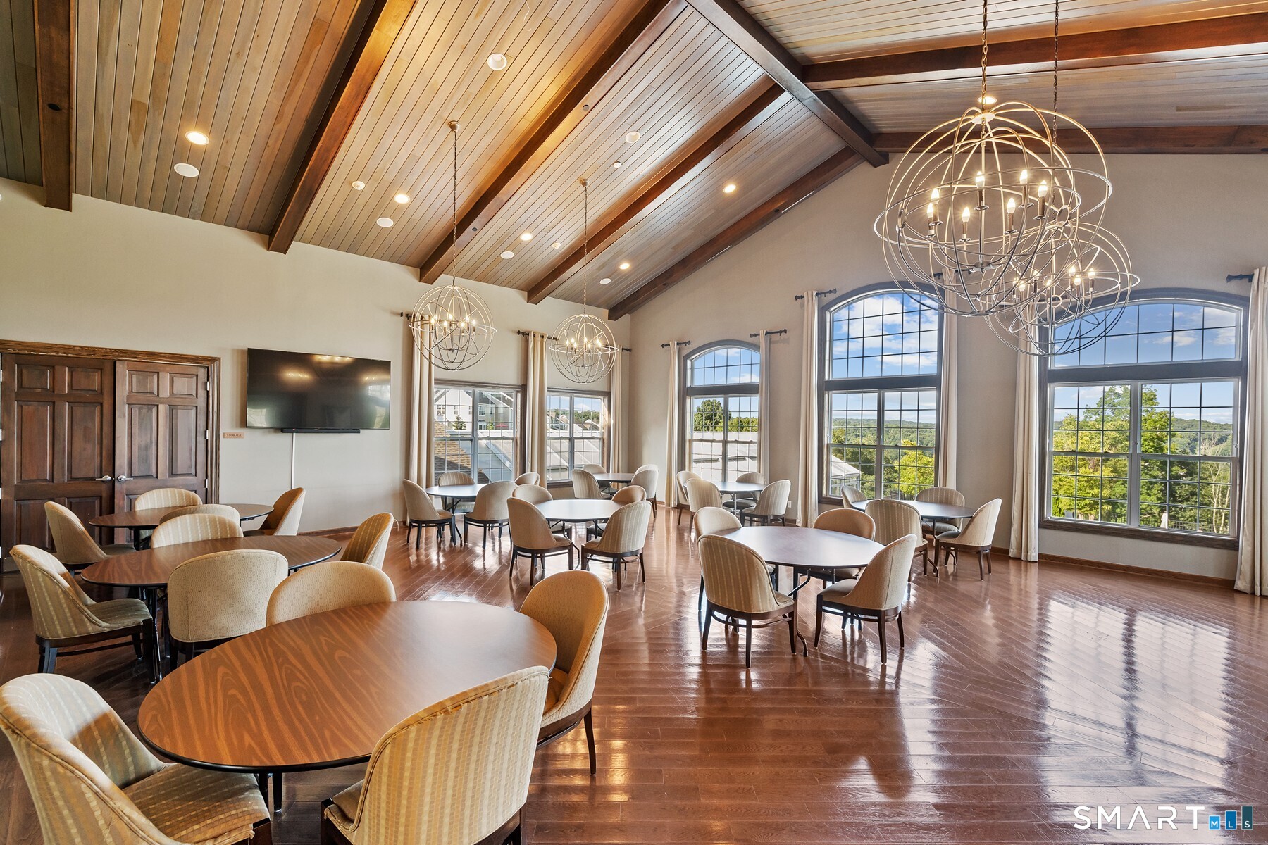 13 Mercy Street, Unit 13 Danbury, CT 06810 - Photo 35 of 40 a view of a dining room with furniture window and outside view