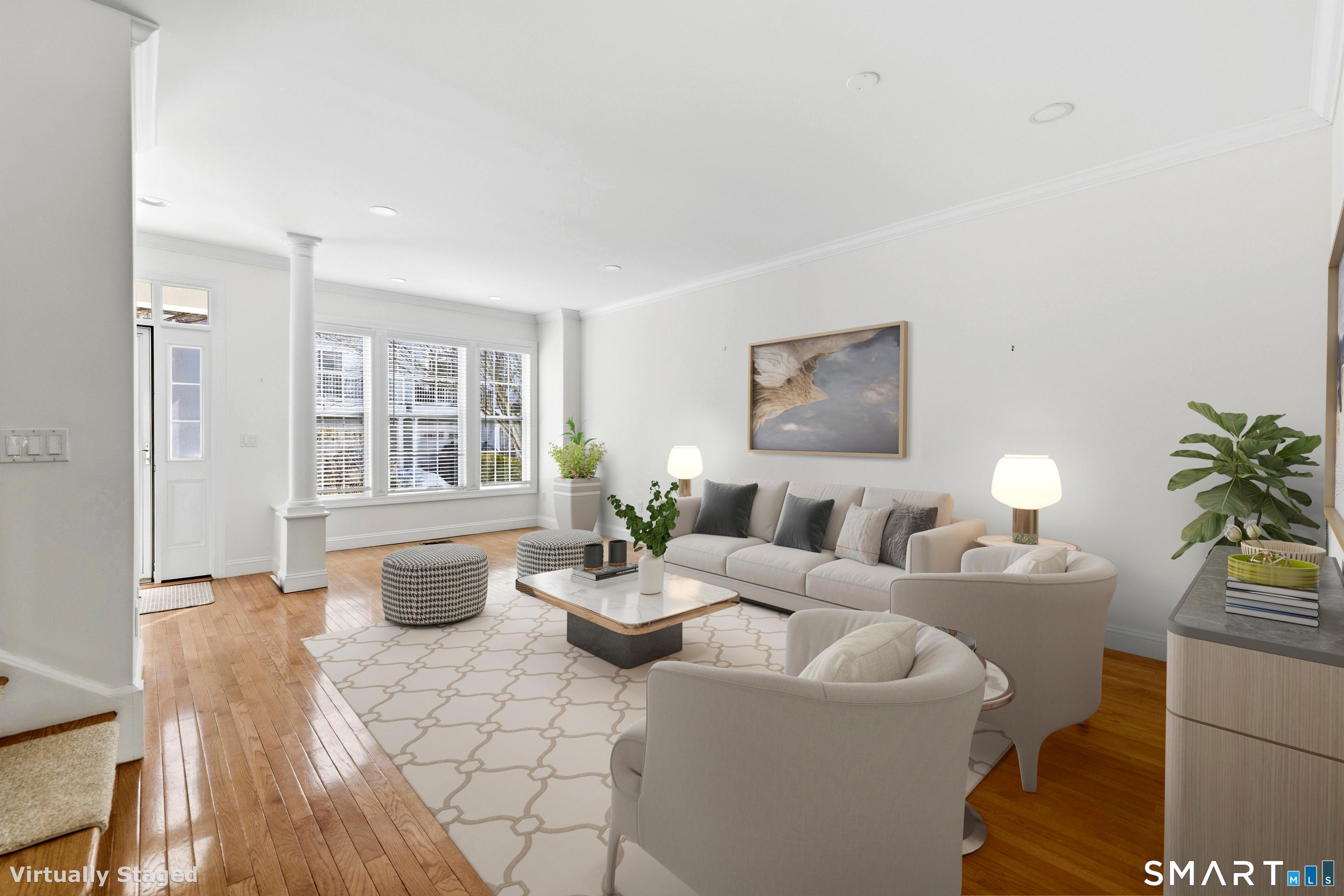 13 Mercy Street, Unit 13 Danbury, CT 06810 - Photo 5 of 40 a living room with furniture a window and a table