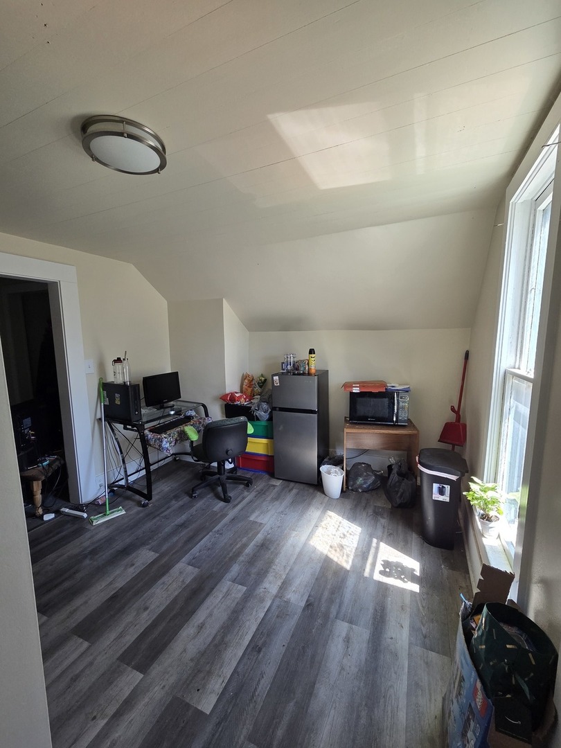 335 6th Avenue North Clinton, IA 52732 - Photo 17 of 23 a view of a room with workspace and a window