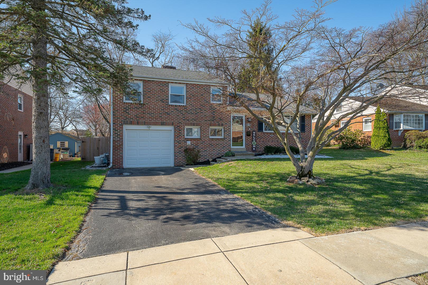 334 Parham Road Springfield, PA 19064 - Photo 1 of 45 a front view of a house with a yard
