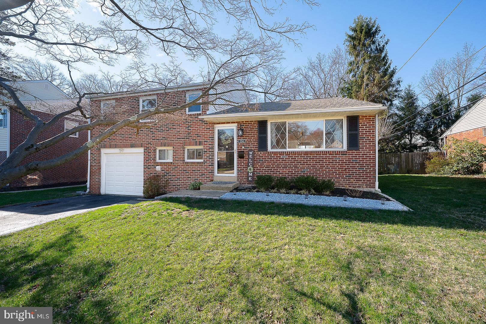 334 Parham Road Springfield, PA 19064 - Photo 2 of 45 a front view of a house with a yard
