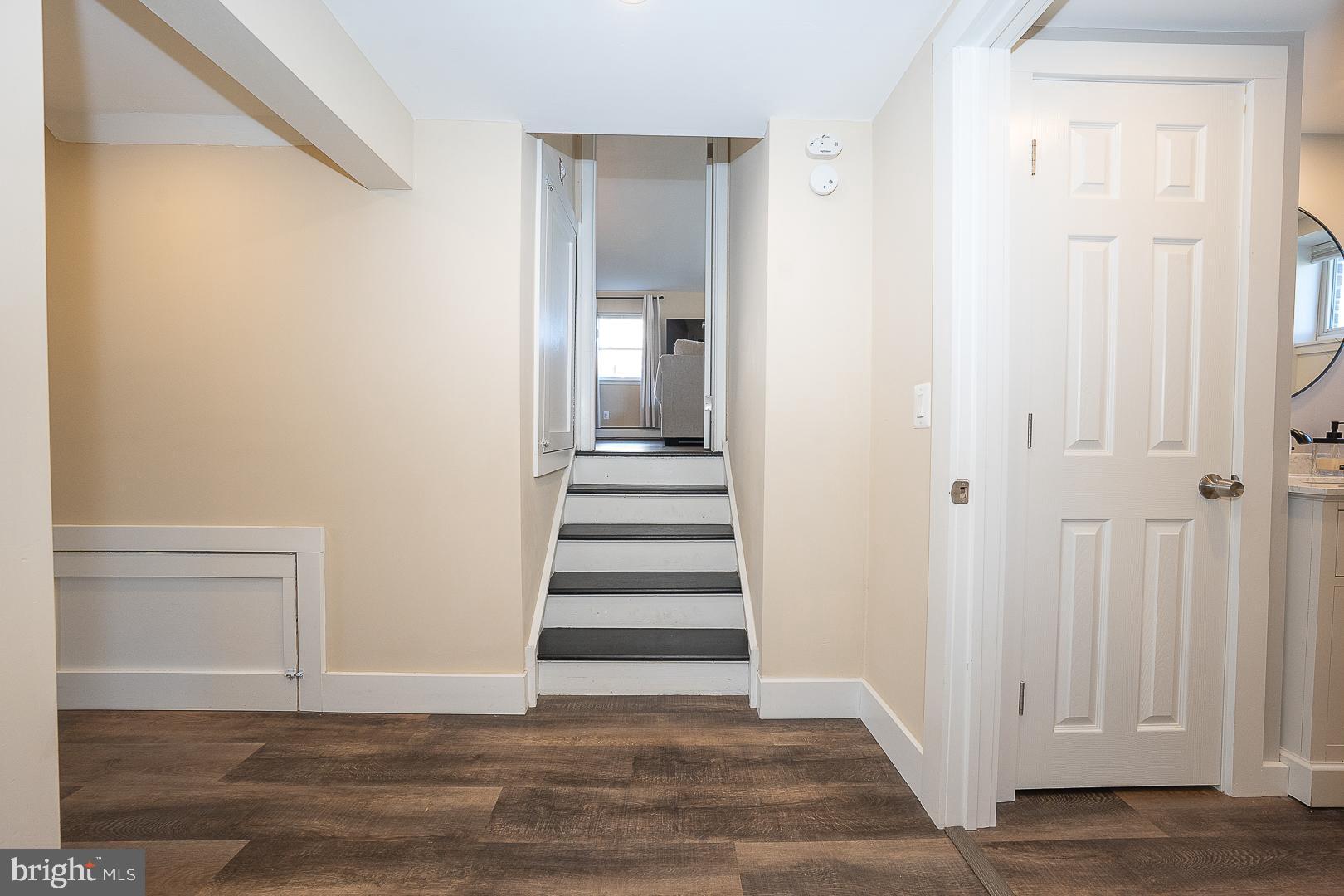 334 Parham Road Springfield, PA 19064 - Photo 33 of 45 a view of a hallway with wooden floor and entryway