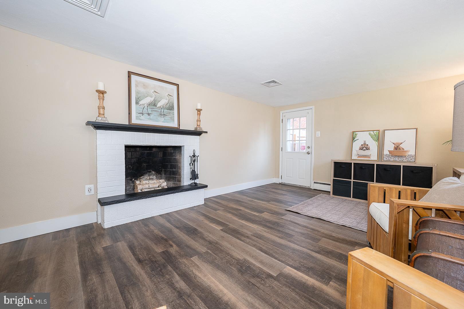 334 Parham Road Springfield, PA 19064 - Photo 36 of 45 a view of a livingroom with furniture and wooden floor