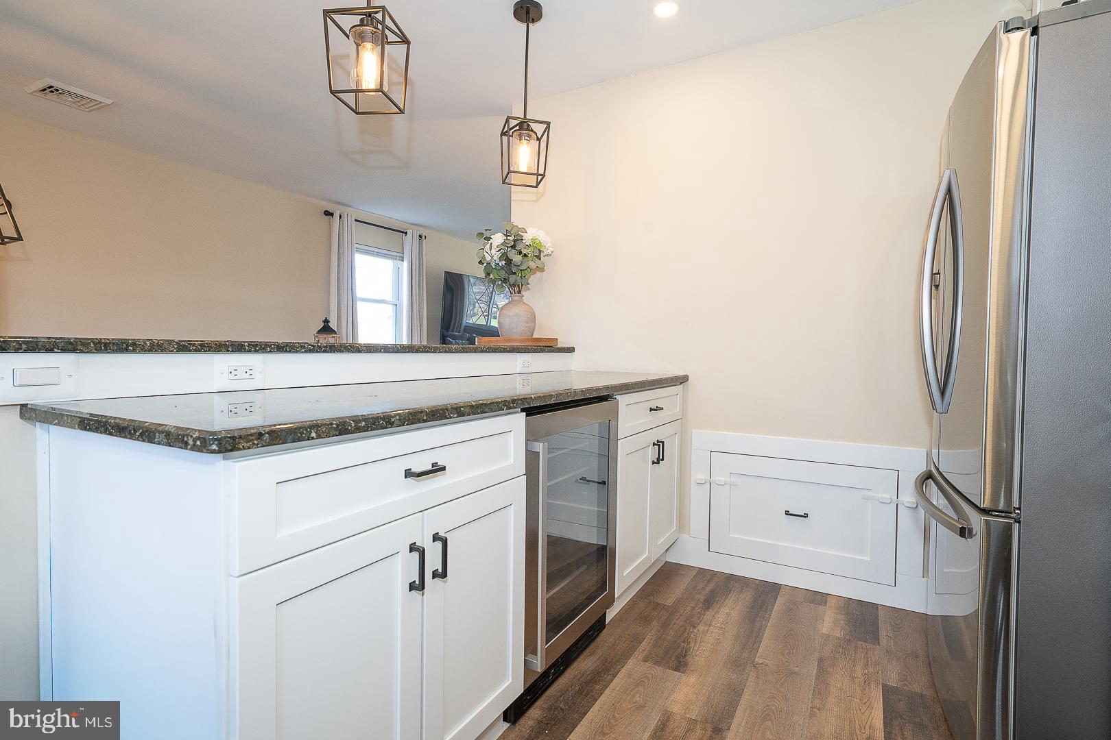 334 Parham Road Springfield, PA 19064 - Photo 9 of 45 a kitchen with a refrigerator and countertop