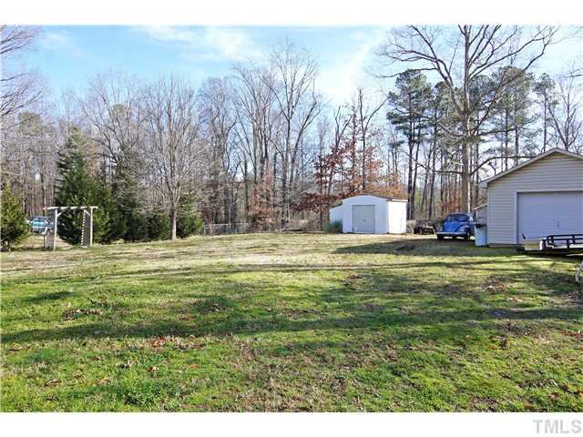 933 Allister Road Durham, NC 27703 - Photo 20 of 20 Large level backyard with even more Storage.