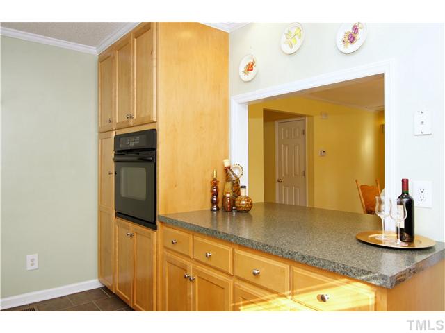 933 Allister Road Durham, NC 27703 - Photo 8 of 20 Cabinets galore and open to the Formal Dining Room.