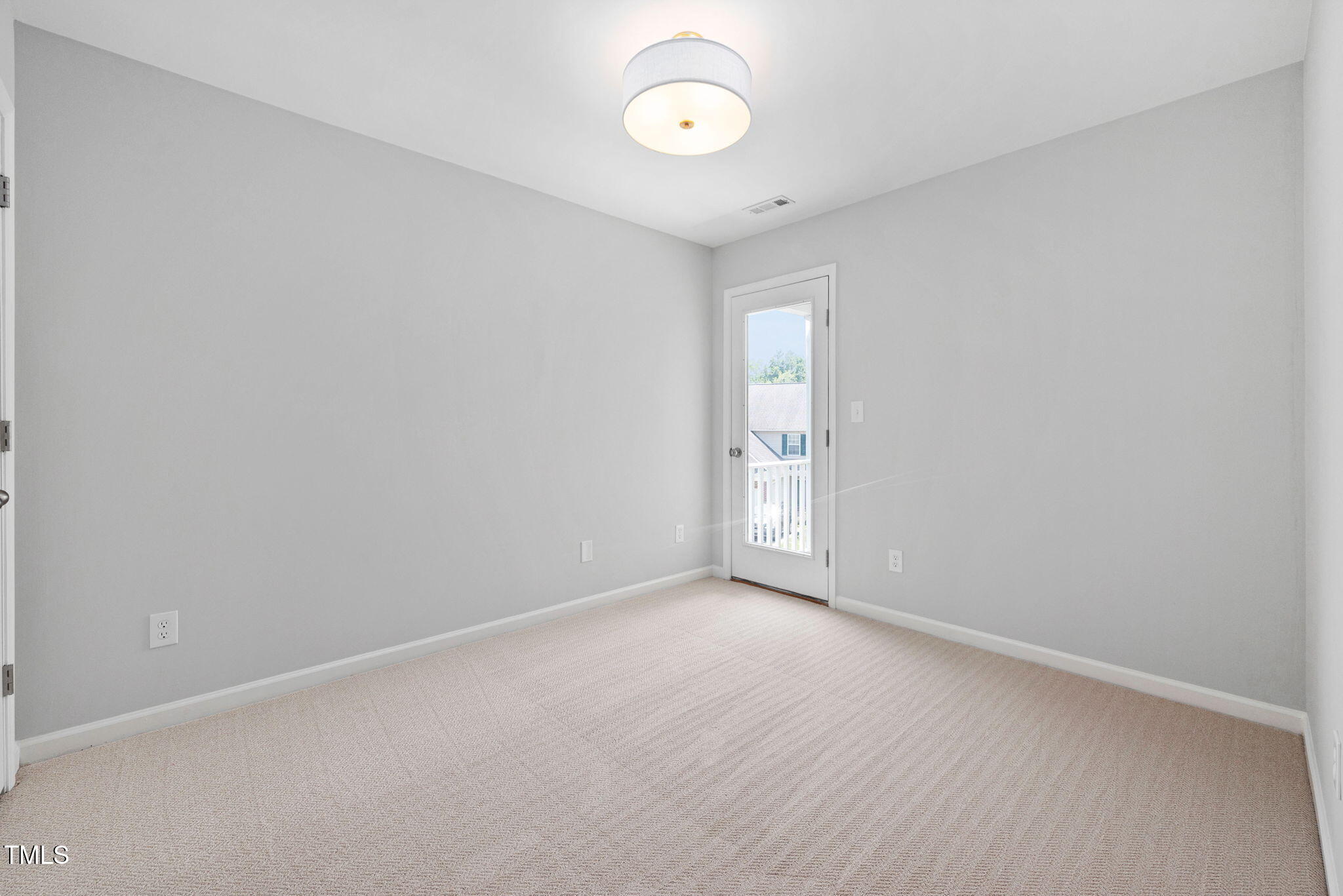 2040 Persimmon Ridge Drive Raleigh, NC 27604 - Photo 17 of 39 a view of an empty room with a window
