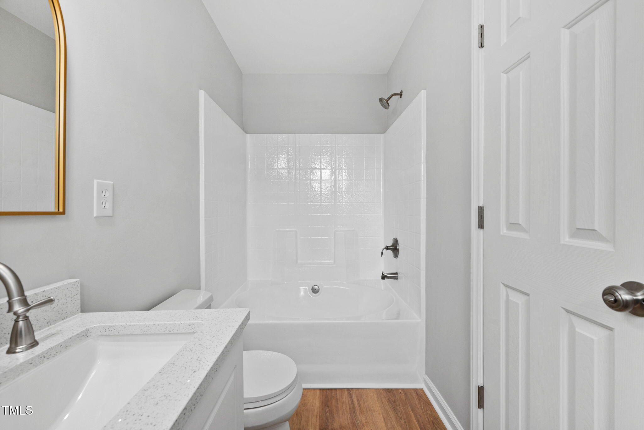2040 Persimmon Ridge Drive Raleigh, NC 27604 - Photo 19 of 39 a bathroom with a sink a toilet and shower