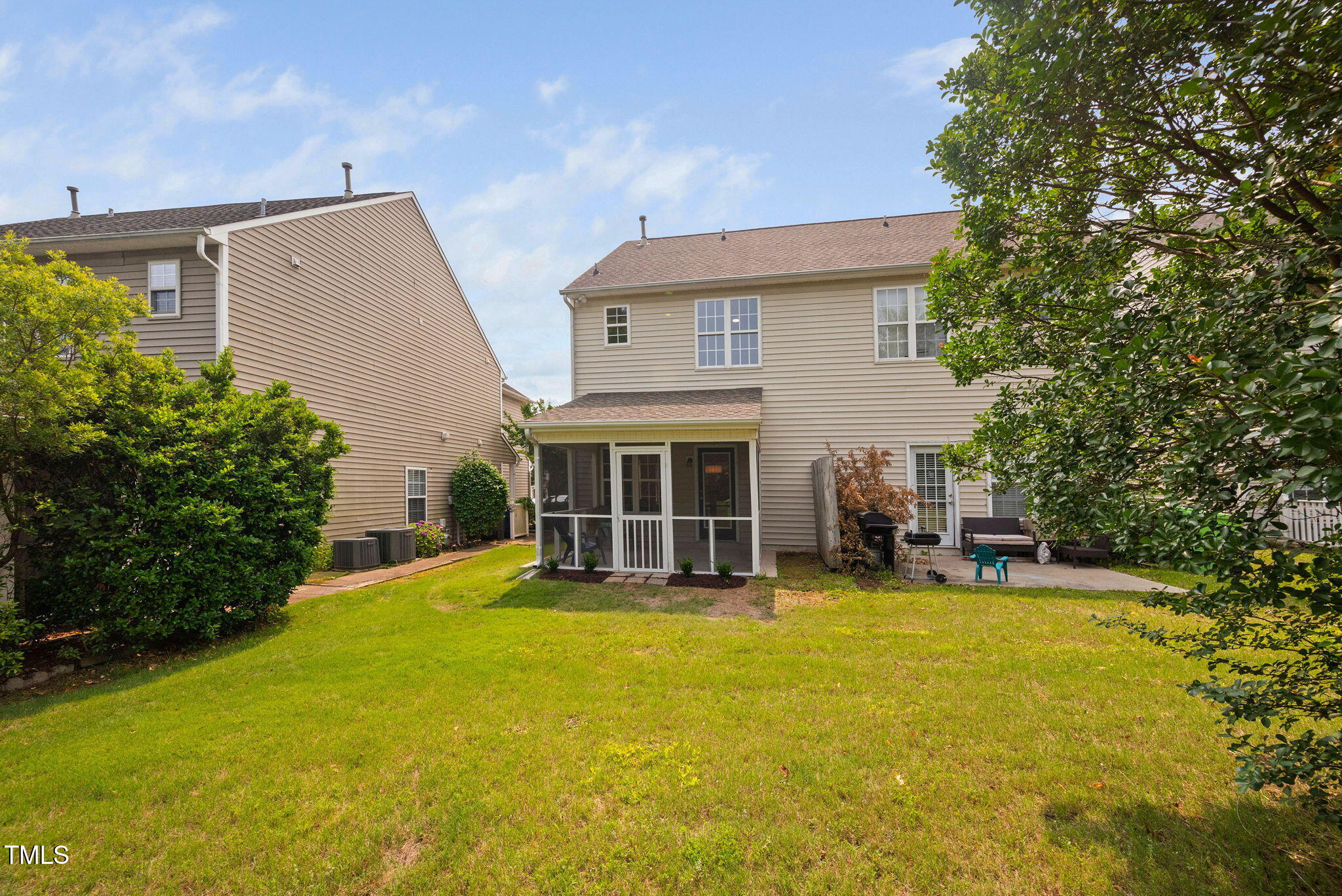2040 Persimmon Ridge Drive Raleigh, NC 27604 - Photo 32 of 39 a view of a house with a yard and sitting area