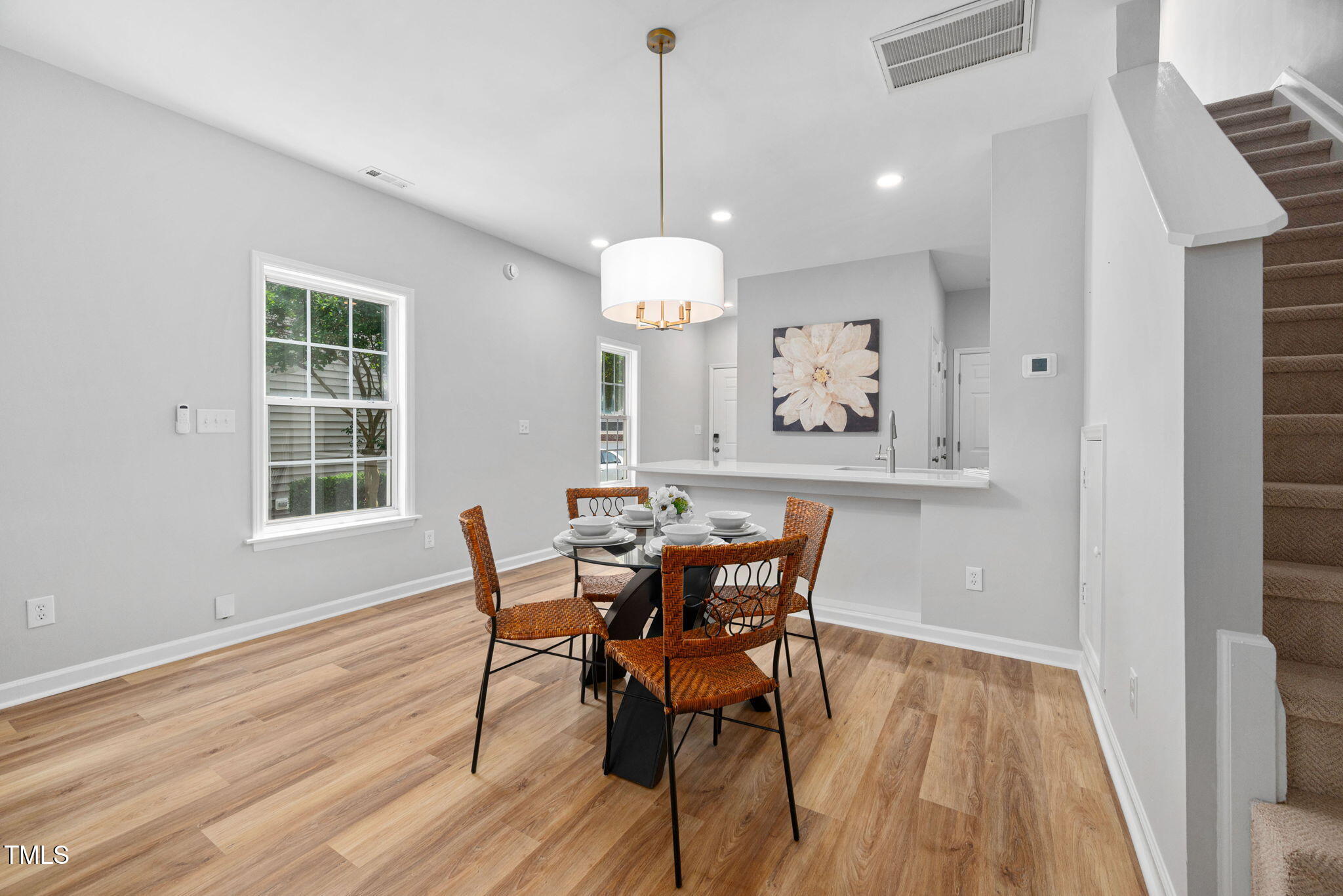 2040 Persimmon Ridge Drive Raleigh, NC 27604 - Photo 6 of 39 a view of a dining room with furniture window and wooden floor