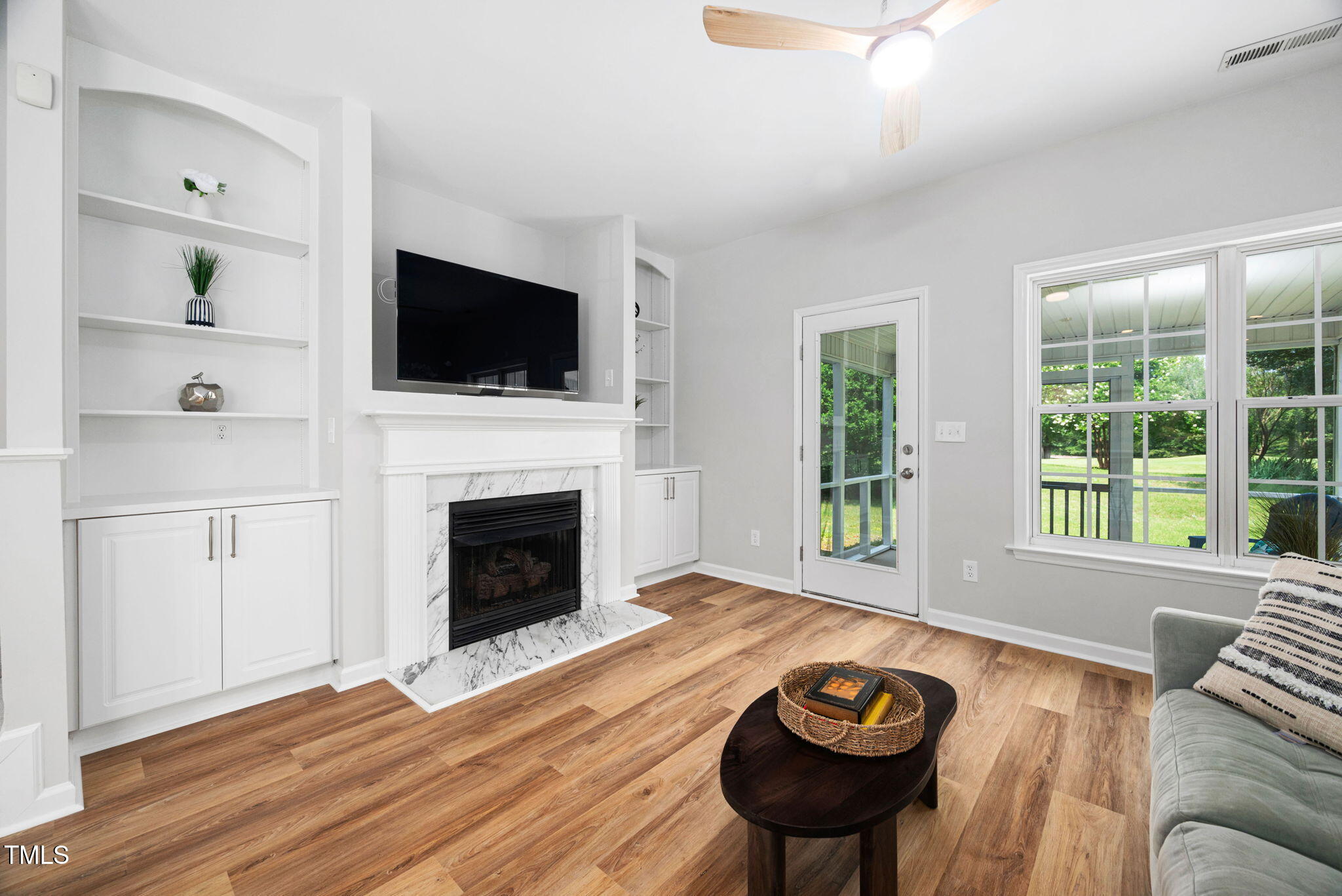 2040 Persimmon Ridge Drive Raleigh, NC 27604 - Photo 8 of 39 a living room with furniture and a fireplace