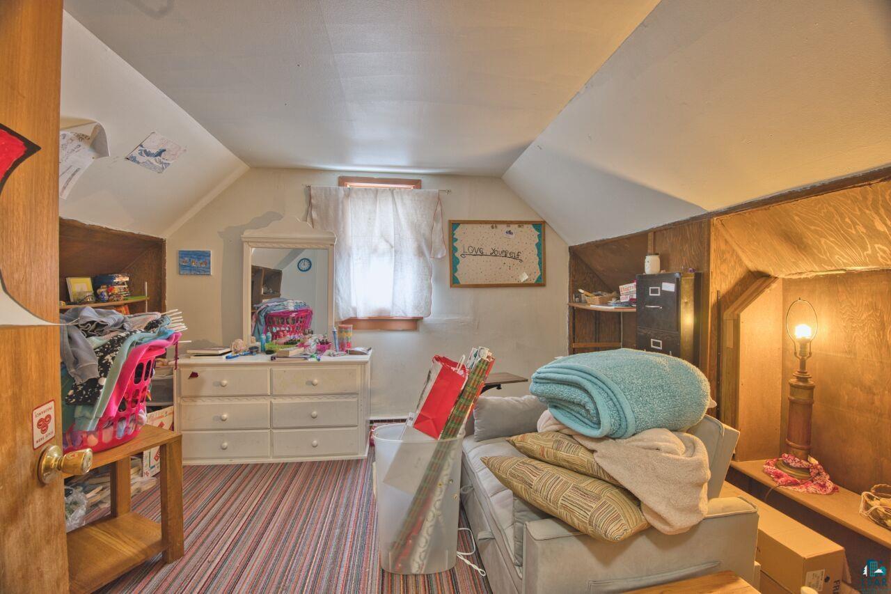 417 Arlington Road Hoyt Lakes, MN 55750 - Photo 15 of 32 Bedroom featuring dark carpet