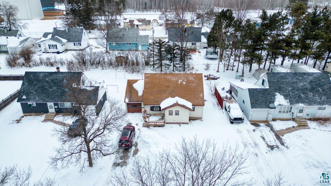 417 Arlington Road Hoyt Lakes, MN 55750 - Photo 28 of 32 Snowy aerial view with a residential view