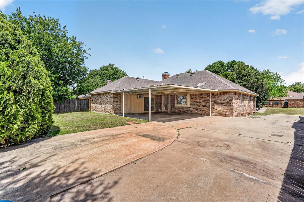 2403 Ridgevalley Drive McKinney, TX 75071 - Photo 20 of 21 a front view of a house with a yard