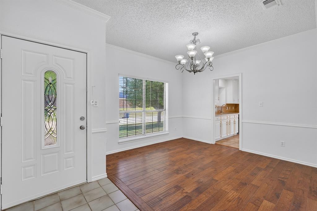 2403 Ridgevalley Drive McKinney, TX 75071 - Photo 2 of 21 a view of an empty room with a window