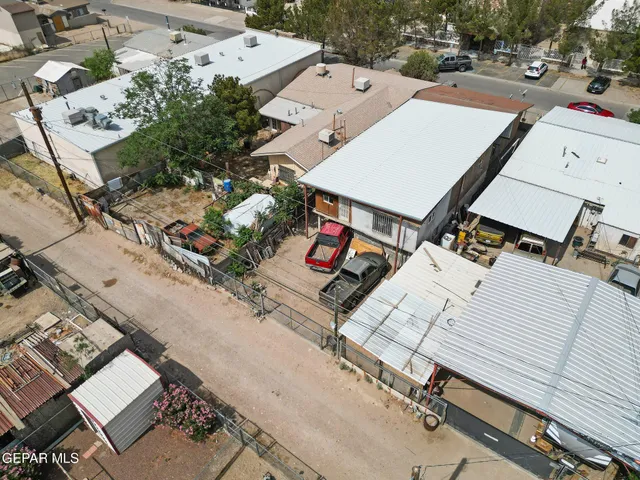 an aerial view of a yard with table and chairs