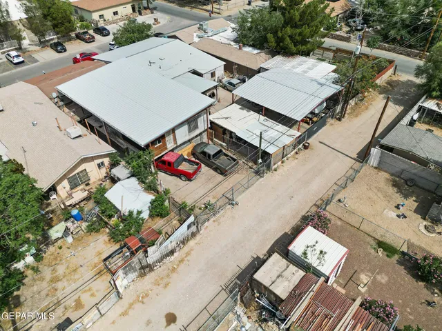 an aerial view of residential house with an outdoor space