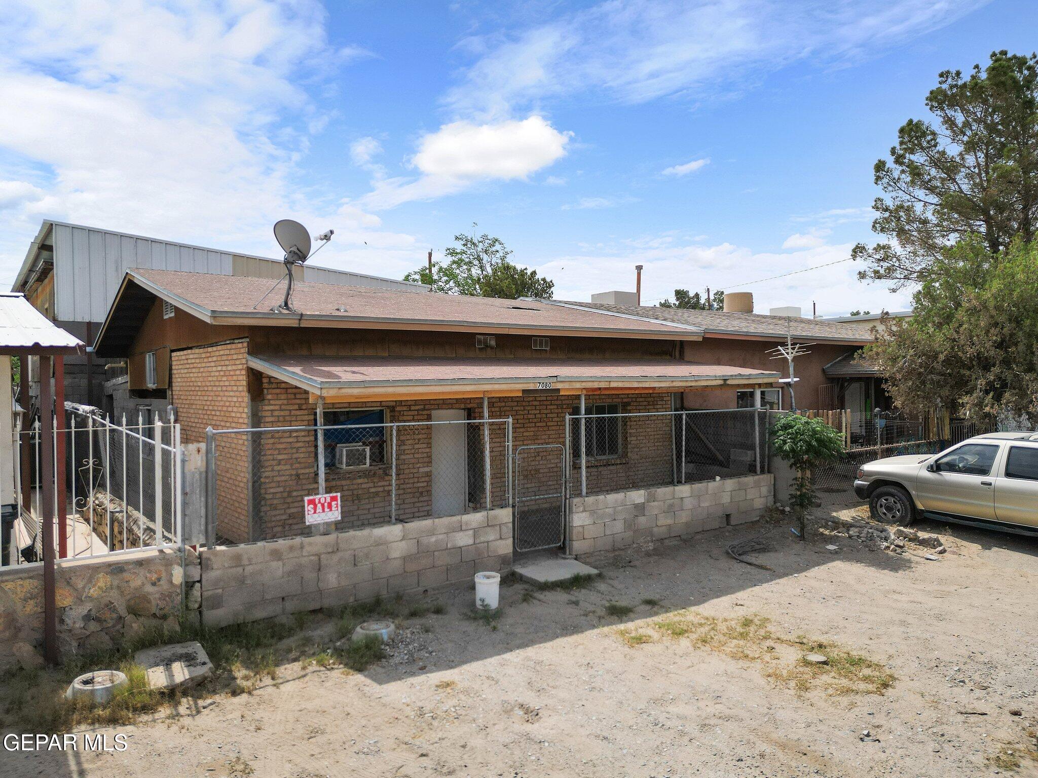 7080 2nd Avenue Canutillo, TX 79835 - Photo 2 of 38 a view of a house with a backyard and porch
