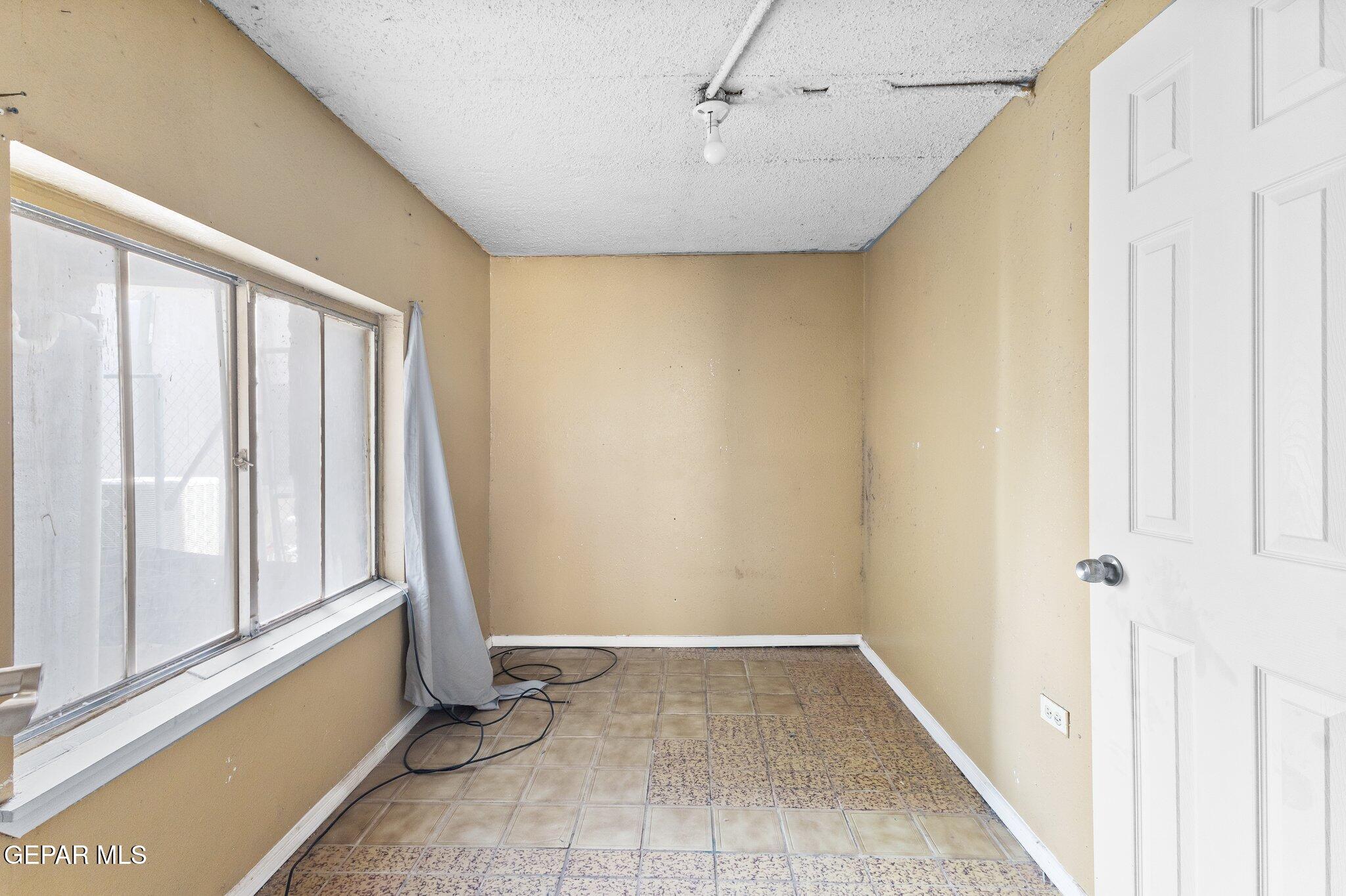 7080 2nd Avenue Canutillo, TX 79835 - Photo 27 of 38 a view of an empty room with a window
