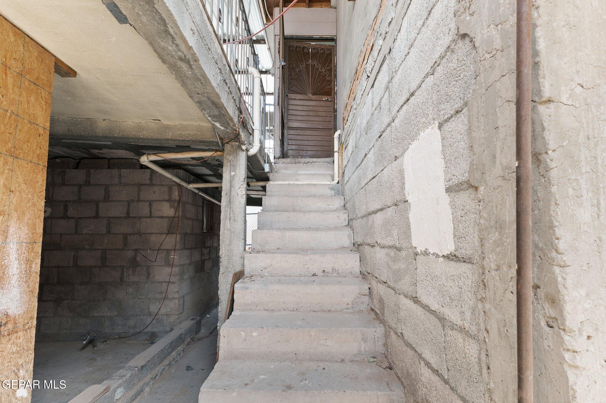 7080 2nd Avenue Canutillo, TX 79835 - Photo 28 of 38 a view of staircase with white walls and white door