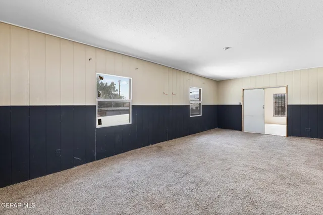 a big room with closet and cabinet