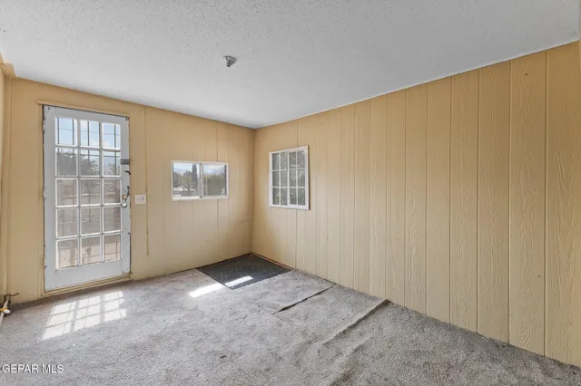 a swimming pool with outdoor seating