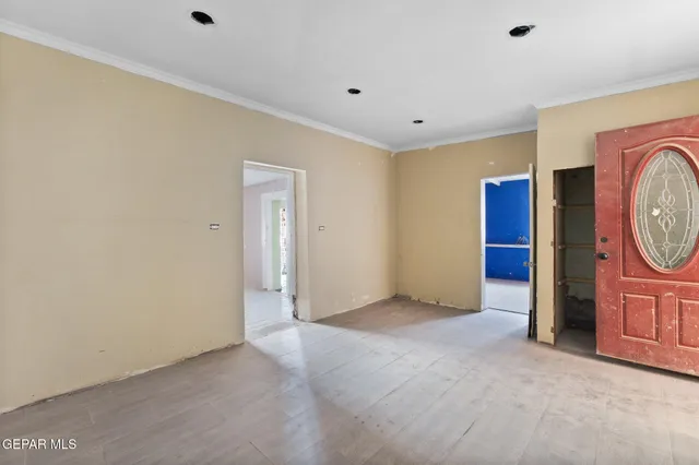 a view of a hallway with a washer and dryer