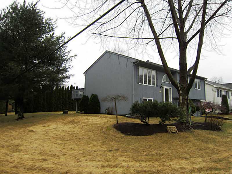 175 Mohawk Trail Cranston, RI 02921 - Photo 16 of 19 Exterior Front. House sits on away from street on large corner lot