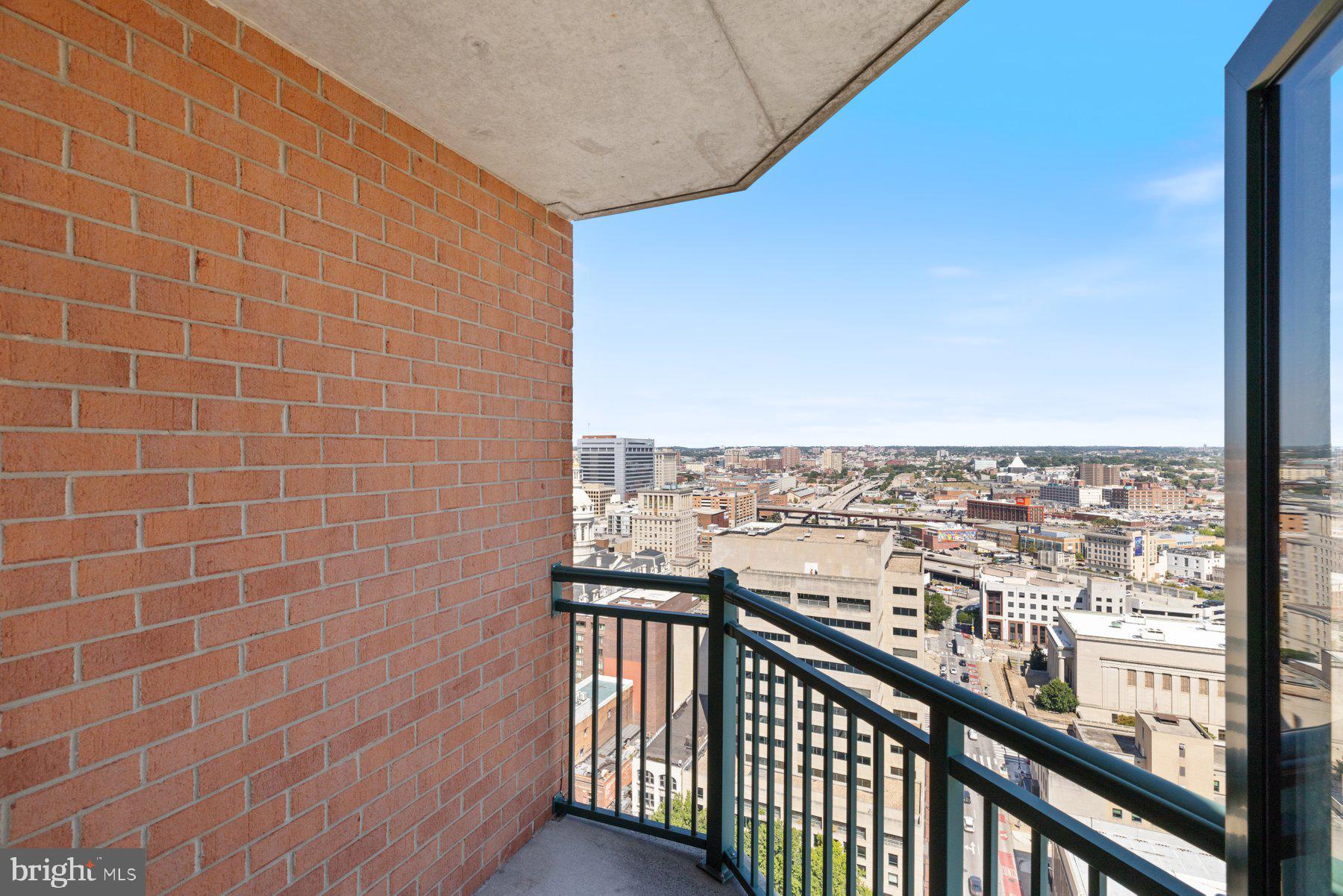 414 Water Street, Unit 2512 Baltimore, MD 21202 - Photo 11 of 40 a view of a balcony with city