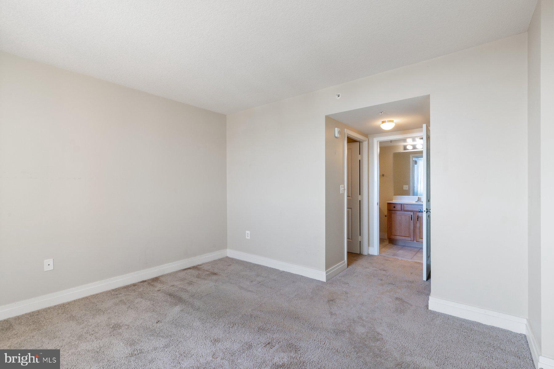 414 Water Street, Unit 2512 Baltimore, MD 21202 - Photo 16 of 40 a view of an empty room