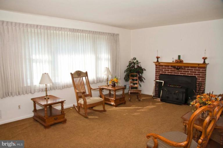 9824 Gunforge Road Perry Hall, MD 21128 - Photo 6 of 20 wood burning fire place.all curtains will stay.