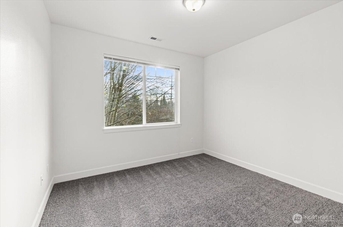 19102 20th Drive Southeast, Unit B206 Bothell, WA 98012 - Photo 32 of 39 an empty room with a window