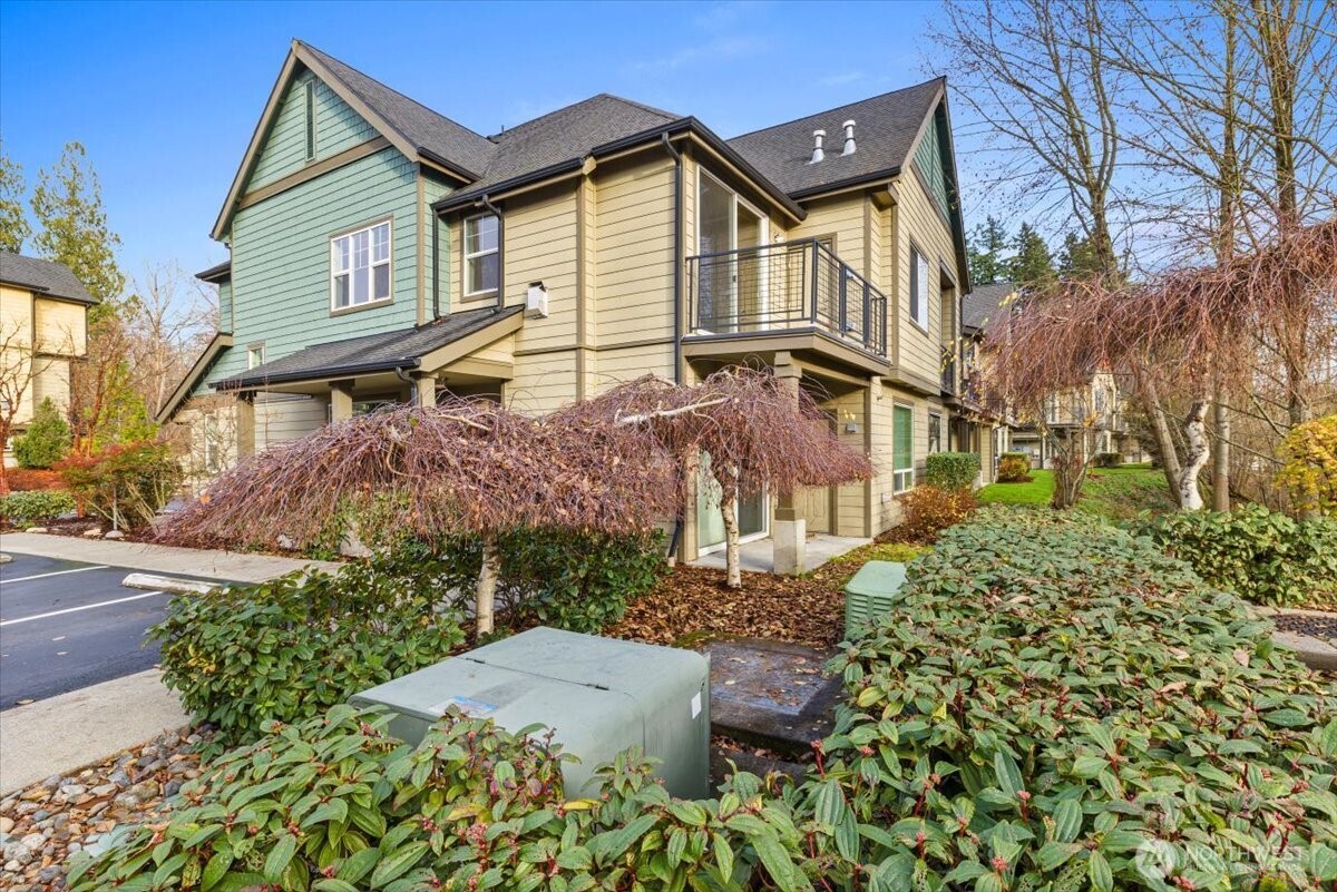 19102 20th Drive Southeast, Unit B206 Bothell, WA 98012 - Photo 39 of 39 front view of a house with a yard
