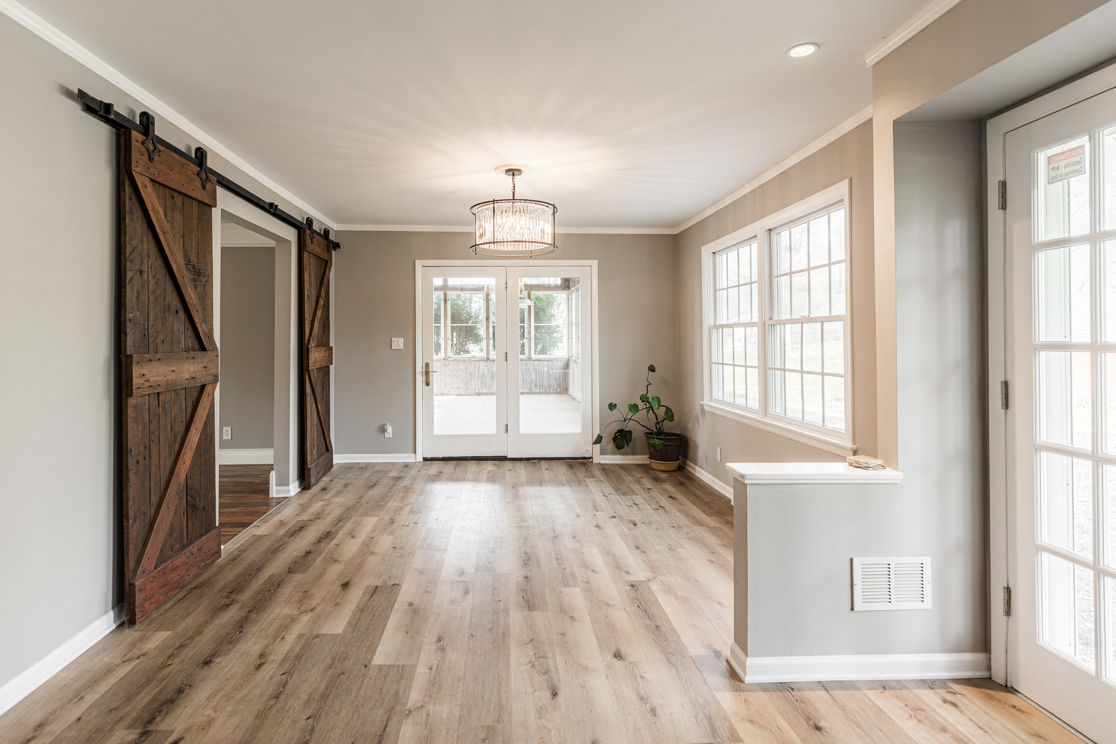 2S739 Nelson Lake Road Batavia, IL 60510 - Photo 29 of 65 a view of an empty room with wooden floor and a window