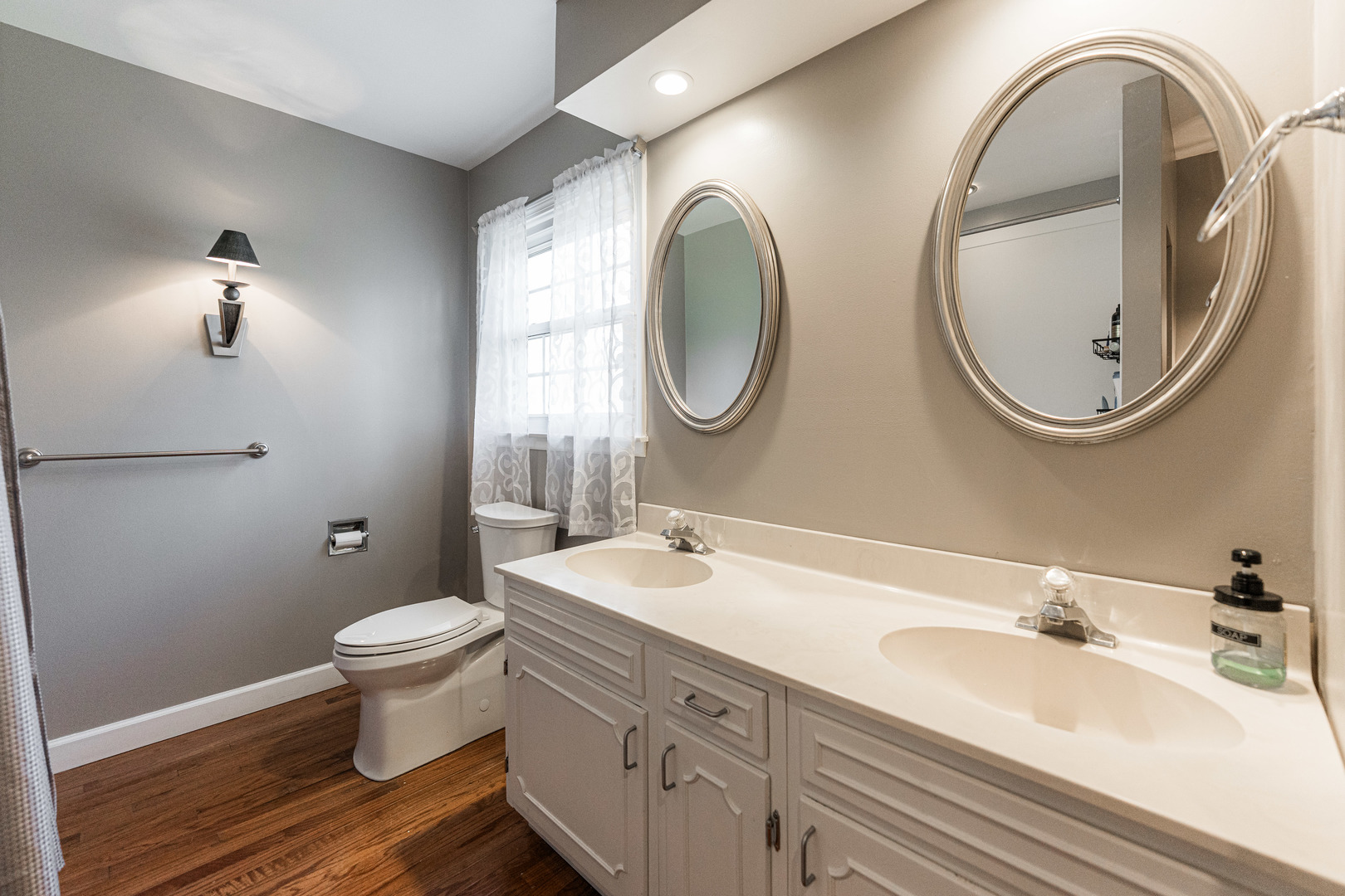 2S739 Nelson Lake Road Batavia, IL 60510 - Photo 44 of 65 a bathroom with 2 sink and a mirror