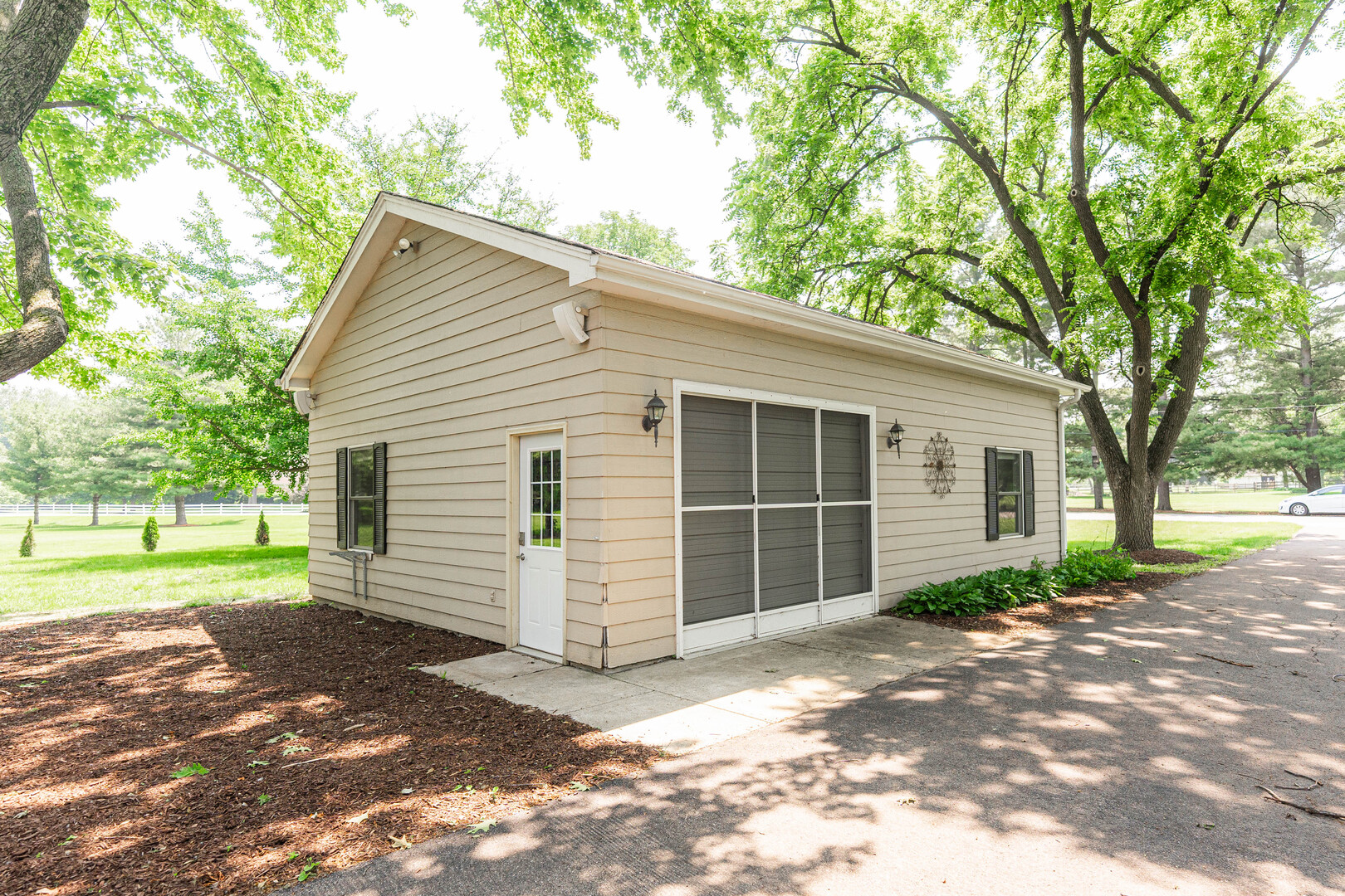2S739 Nelson Lake Road Batavia, IL 60510 - Photo 48 of 65 a view of a house with a yard and garage