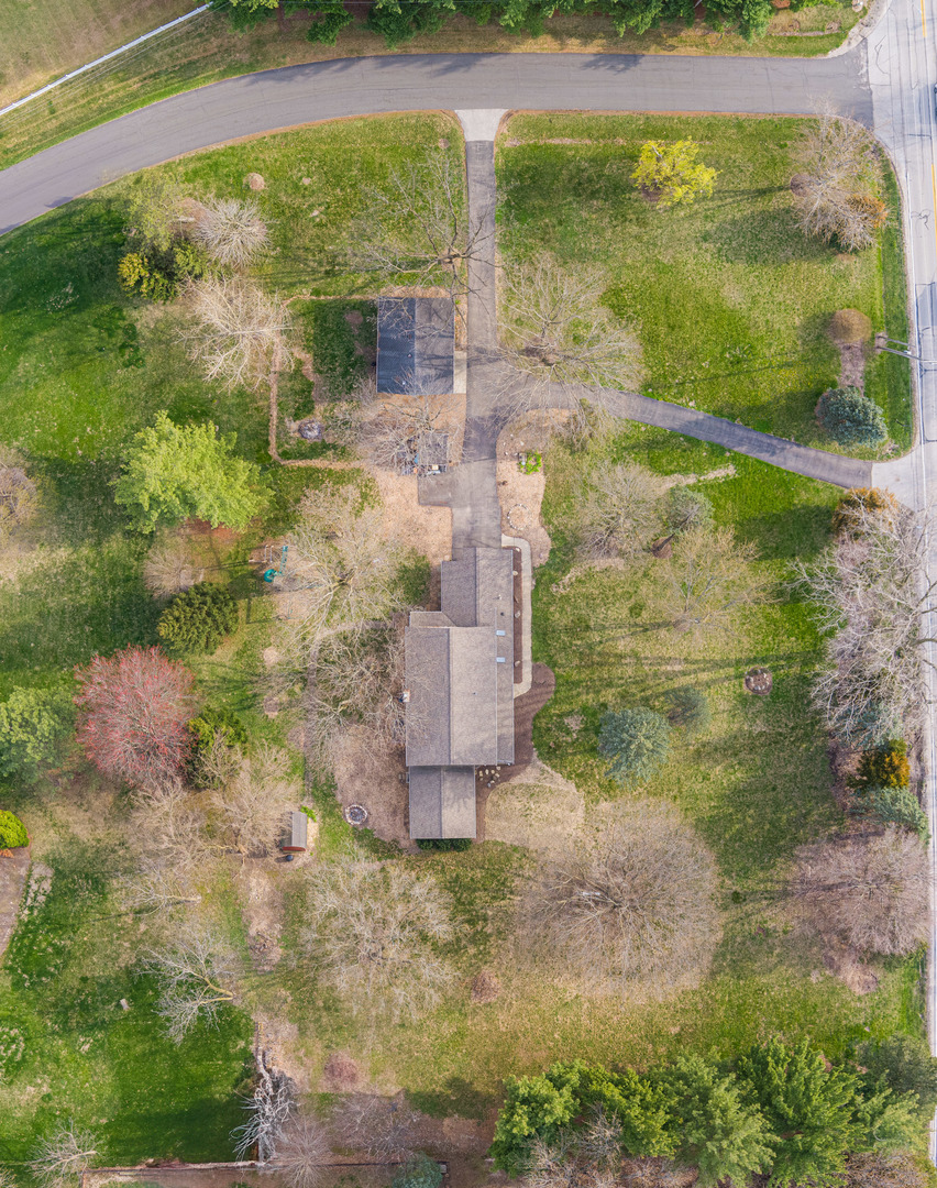 2S739 Nelson Lake Road Batavia, IL 60510 - Photo 5 of 65 a view of a garden with a fountain