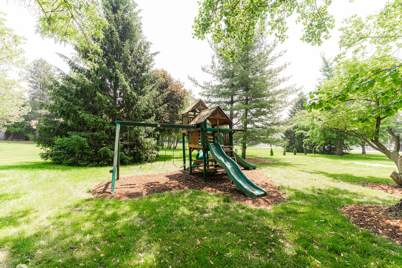 2S739 Nelson Lake Road Batavia, IL 60510 - Photo 57 of 65 a view of a park with swings and slides