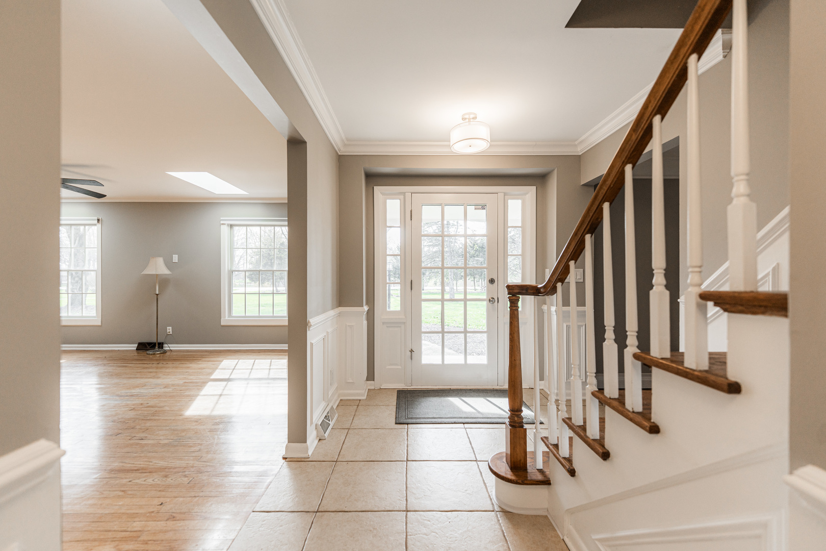 2S739 Nelson Lake Road Batavia, IL 60510 - Photo 8 of 65 a view of an entryway with wooden floor and a livingroom