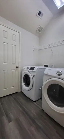 a utility room with dryer and washer