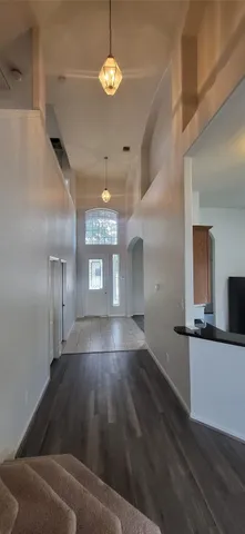 a view of a kitchen with a sink and dishwasher cabinets